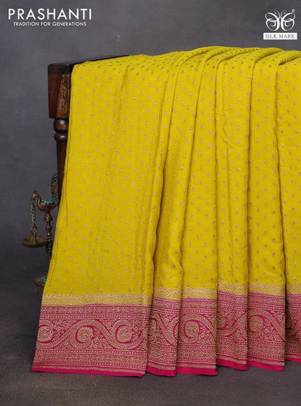 Banarasi crepe saree yellow and pink with allover thread & zari woven butta weaves and woven border