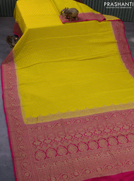 Banarasi crepe saree yellow and pink with allover thread & zari woven butta weaves and woven border