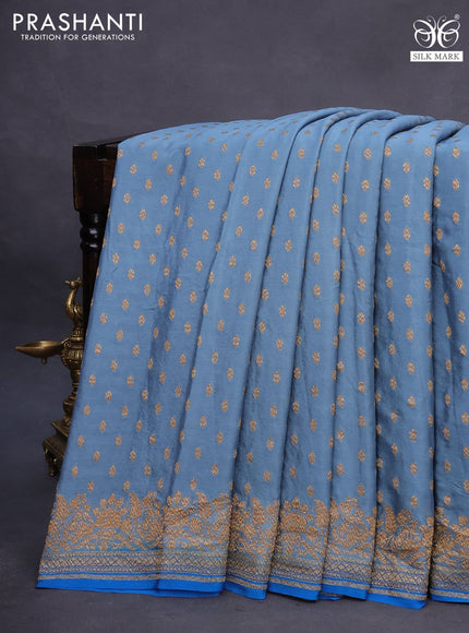 Banarasi crepe saree grey and cs blue with allover thread & zari woven butta weaves and woven border