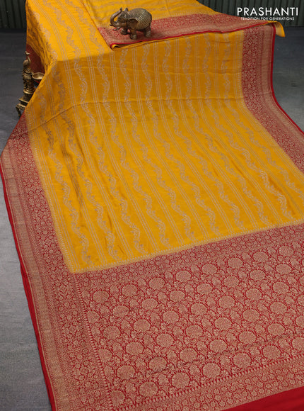 Banarasi crepe saree yellow and red with allover thread & zari weaves and woven border