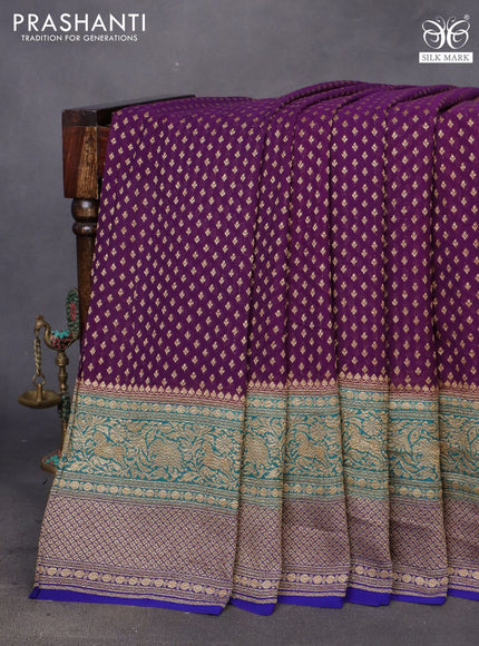 Banarasi georgette saree deep purple and cs blue blue with allover thread & zari woven butta weaves and long woven border