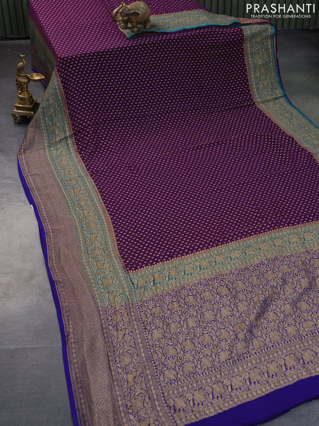 Banarasi georgette saree deep purple and cs blue blue with allover thread & zari woven butta weaves and long woven border