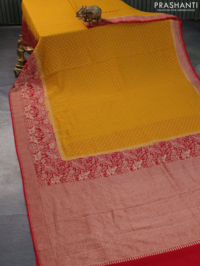 Banarasi georgette saree mustard yellow and red with allover thread & zari woven butta weaves and long woven border