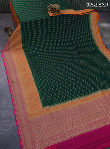 Banarasi georgette saree dark green and orange pink with allover thread & zari butta weaves and long woven border