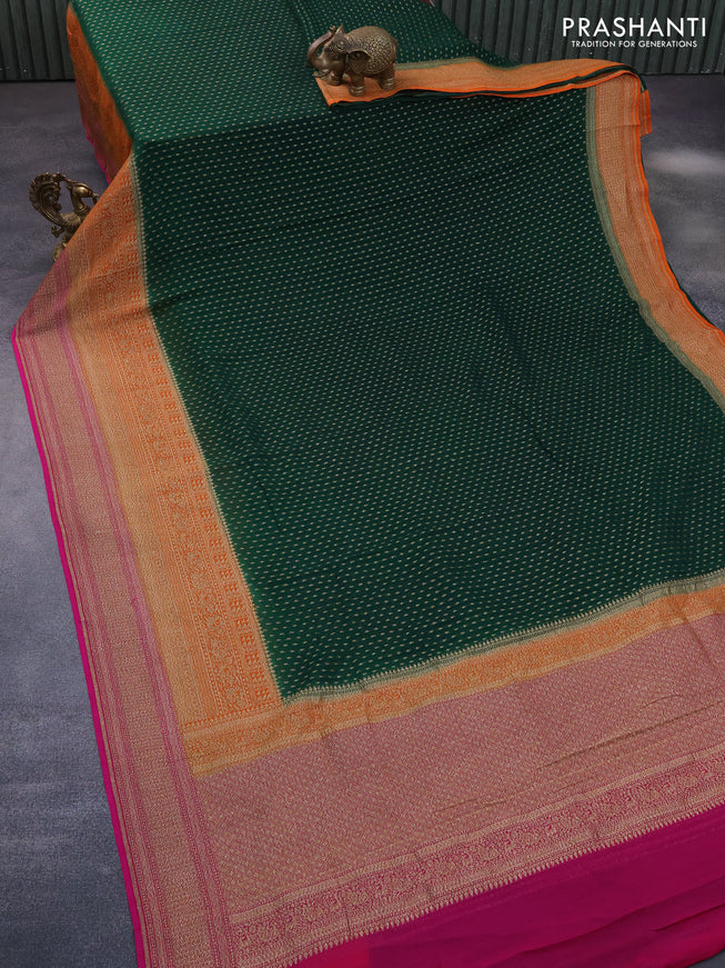 Banarasi georgette saree dark green and orange pink with allover thread & zari butta weaves and long woven border