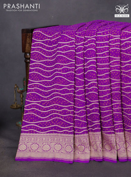 Banarasi georgette saree purple with allover bandhani prints & zari weaves and woven border