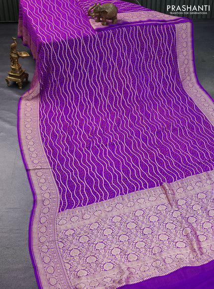 Banarasi georgette saree purple with allover bandhani prints & zari weaves and woven border