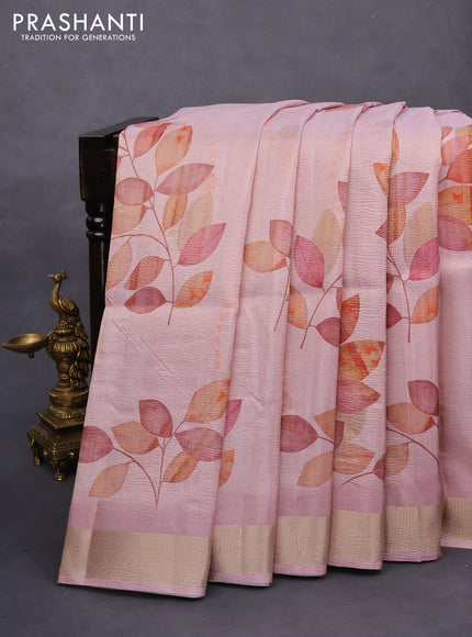 Crushed tissue saree pastel pink with allover leaf digital prints and zari woven border