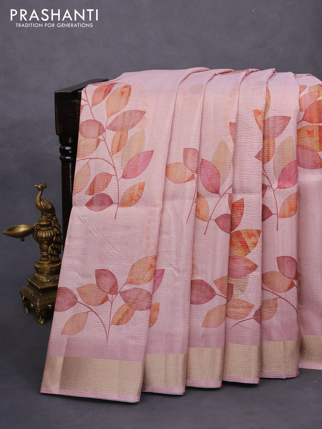 Crushed tissue saree pastel pink with allover leaf digital prints and zari woven border