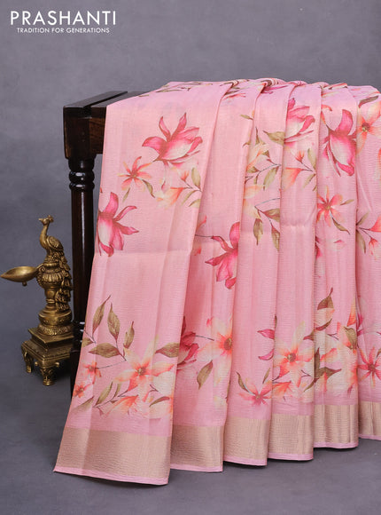 Crushed tissue saree mild peach pink with allover floral digital prints and zari woven border