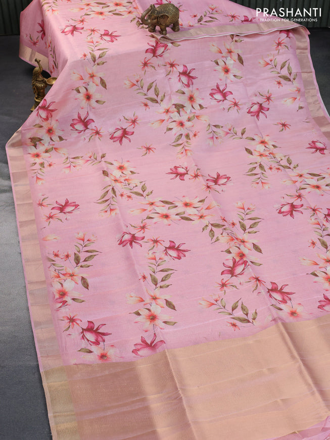 Crushed tissue saree mild peach pink with allover floral digital prints and zari woven border