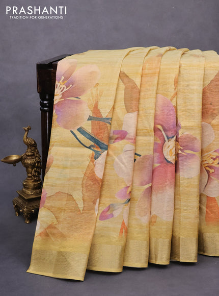 Crushed tissue saree yellow with allover floral digital prints and zari woven border