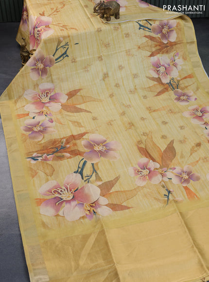 Crushed tissue saree yellow with allover floral digital prints and zari woven border