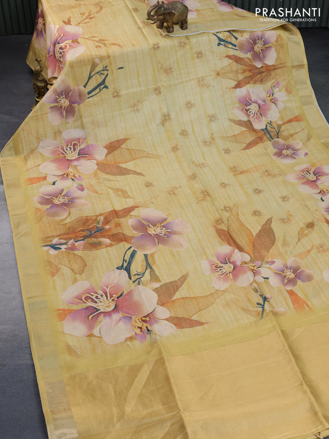 Crushed tissue saree yellow with allover floral digital prints and zari woven border