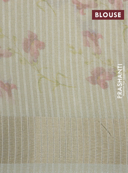 Crushed tissue saree cream with allover floral digital prints and zari woven border