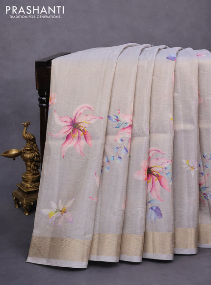 Crushed tissue saree pastel grey with allover floral digital prints and zari woven border