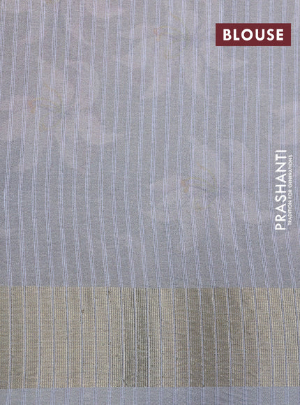 Crushed tissue saree pastel grey with allover floral digital prints and zari woven border