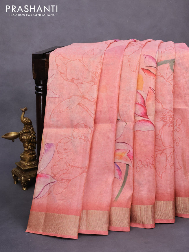 Crushed tissue saree peach shade with allover digital prints and zari woven border