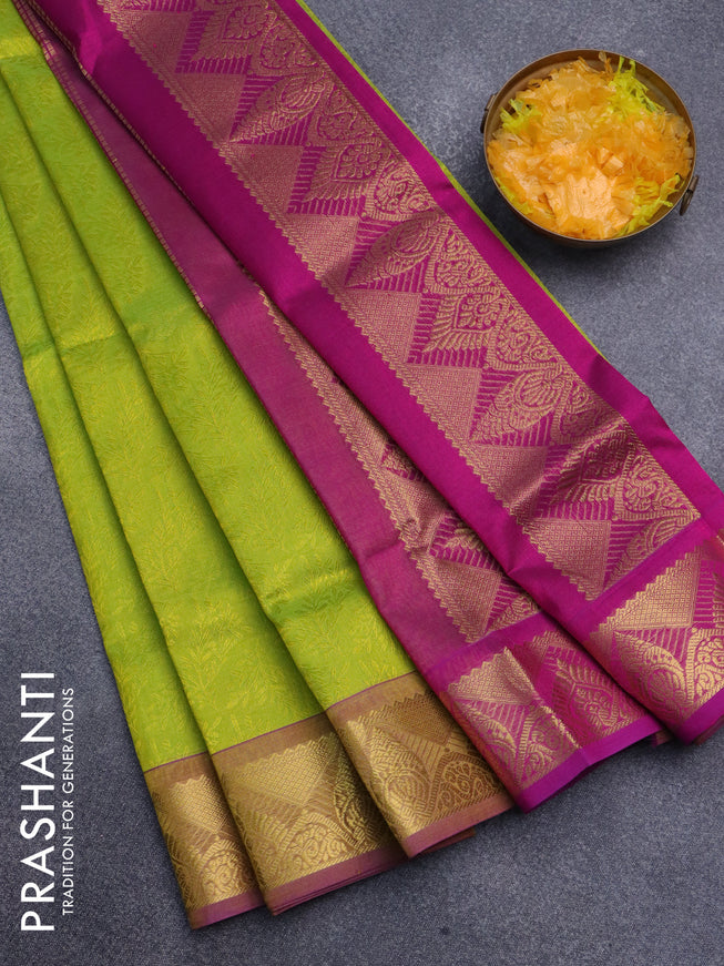 Silk cotton saree lime green and magenta pink with allover self emboss jacquard and rich zari woven border