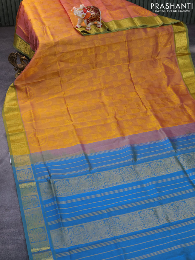 Silk cotton saree dual shade of mustard yellow and dual shade of blue with allover self emboss jacquard and rich zari woven border