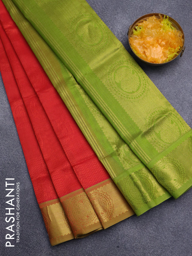 Silk cotton saree orange and light green with allover self emboss jacquard and annam zari woven border