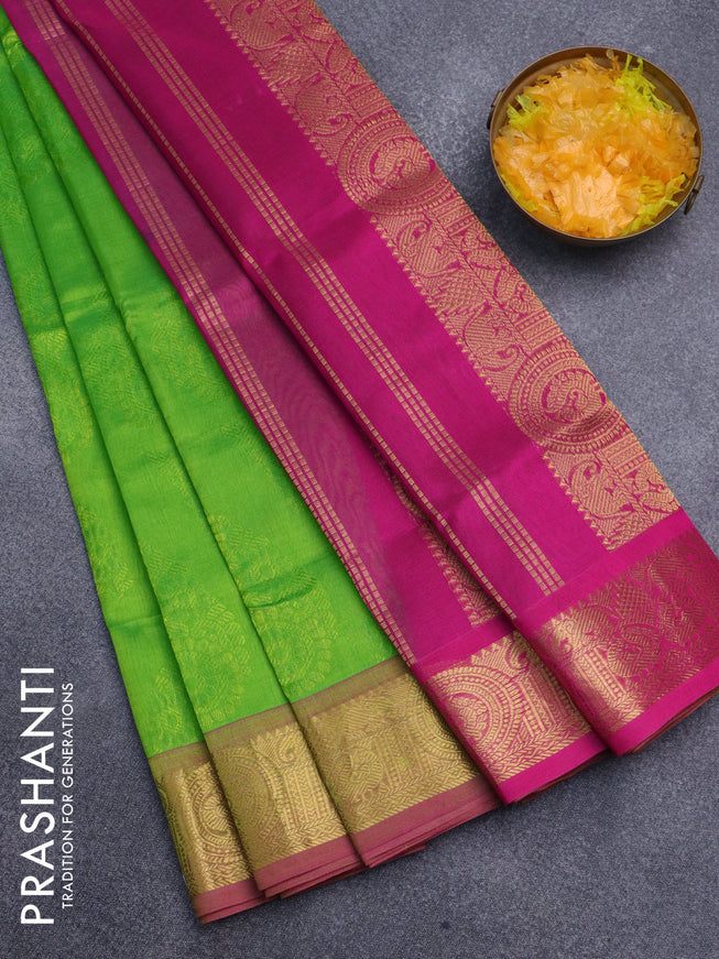 Silk cotton saree light green and pink with allover self emboss jacquard and rich zari woven border