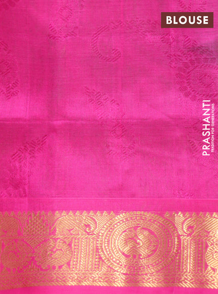 Silk cotton saree light green and pink with allover self emboss jacquard and rich zari woven border