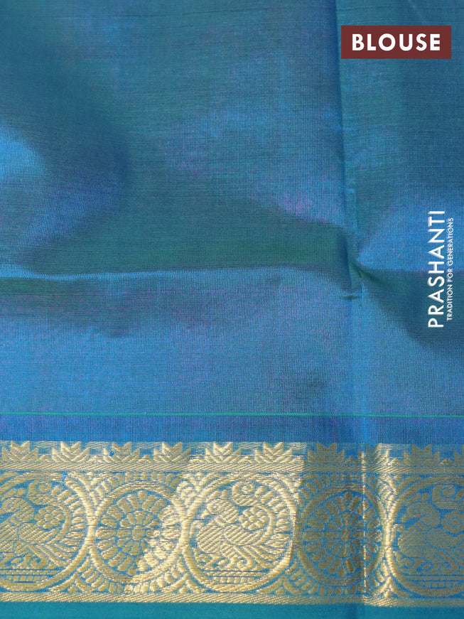 Silk cotton saree pink and dual shade of teal blue with allover self emboss jacquard and zari woven border