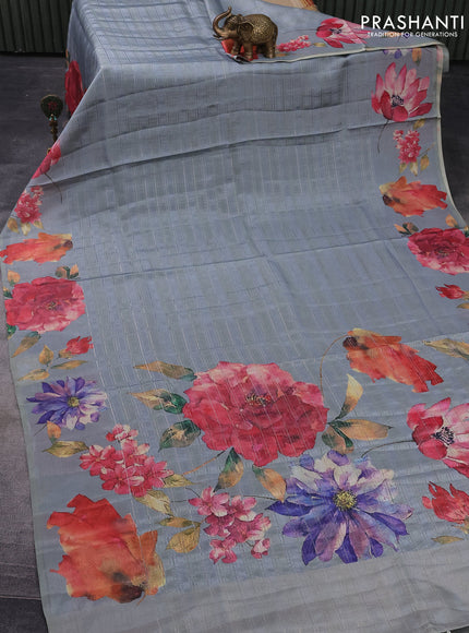 Semi tussar saree grey with allover silver zari strips & floral digital prints and floral digital printed border