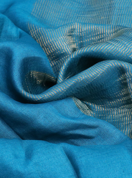 Pure tussar silk saree teal blue and maroon with plain body and small zari woven border