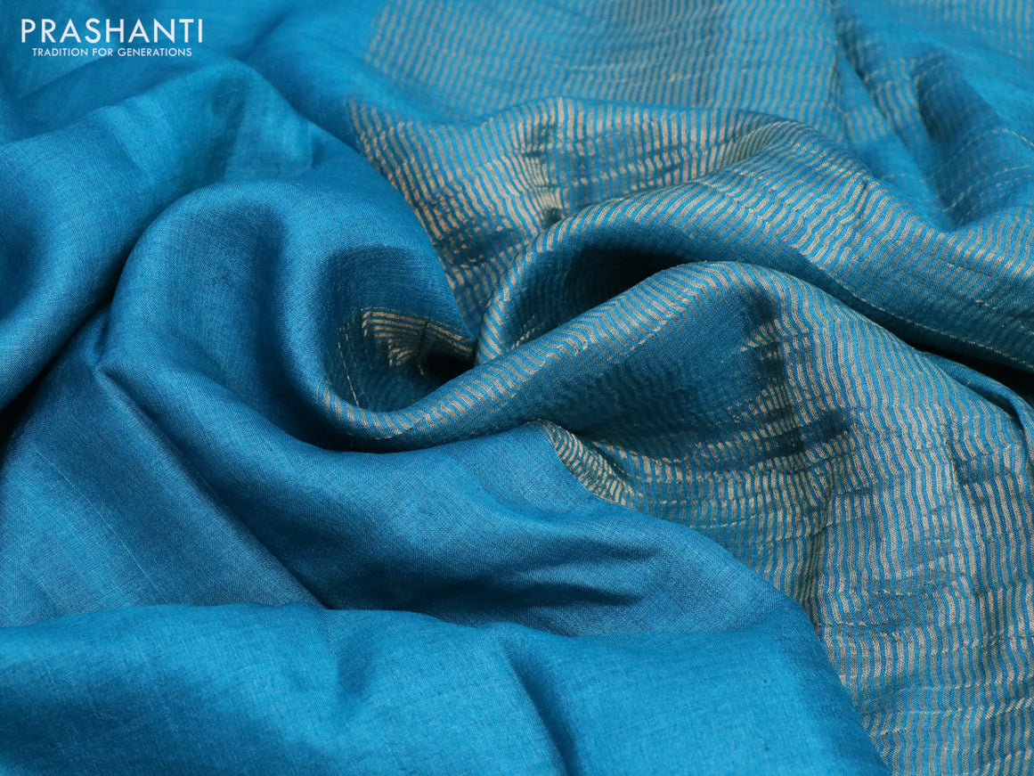 Pure tussar silk saree teal blue and maroon with plain body and small zari woven border