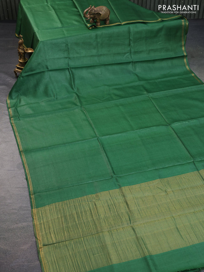 Pure tussar silk saree green and pink with plain body and small zari woven border