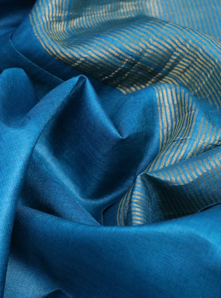 Pure tussar silk saree cs blue and peach shade with plain body and small zari woven border