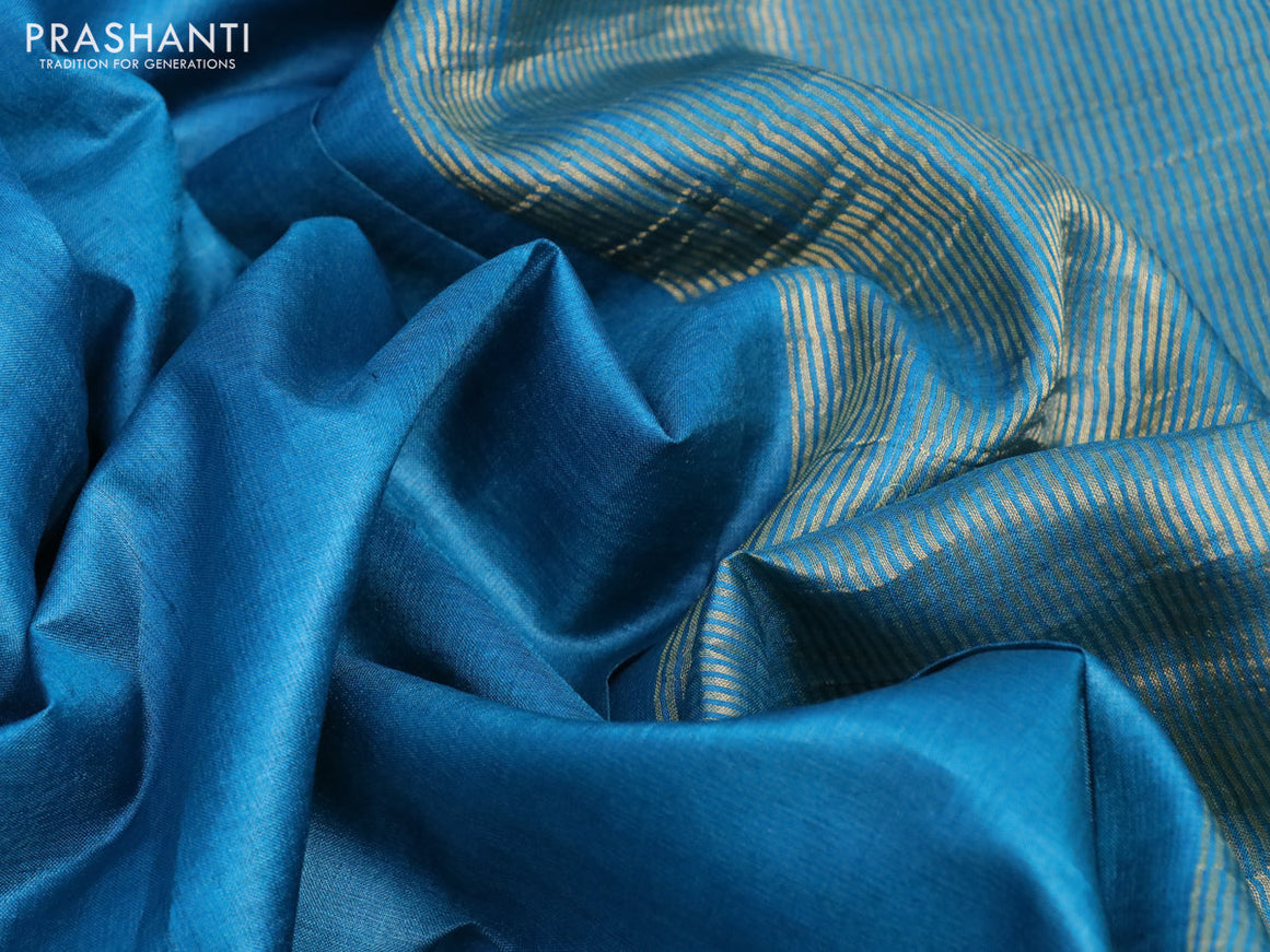 Pure tussar silk saree cs blue and peach shade with plain body and small zari woven border