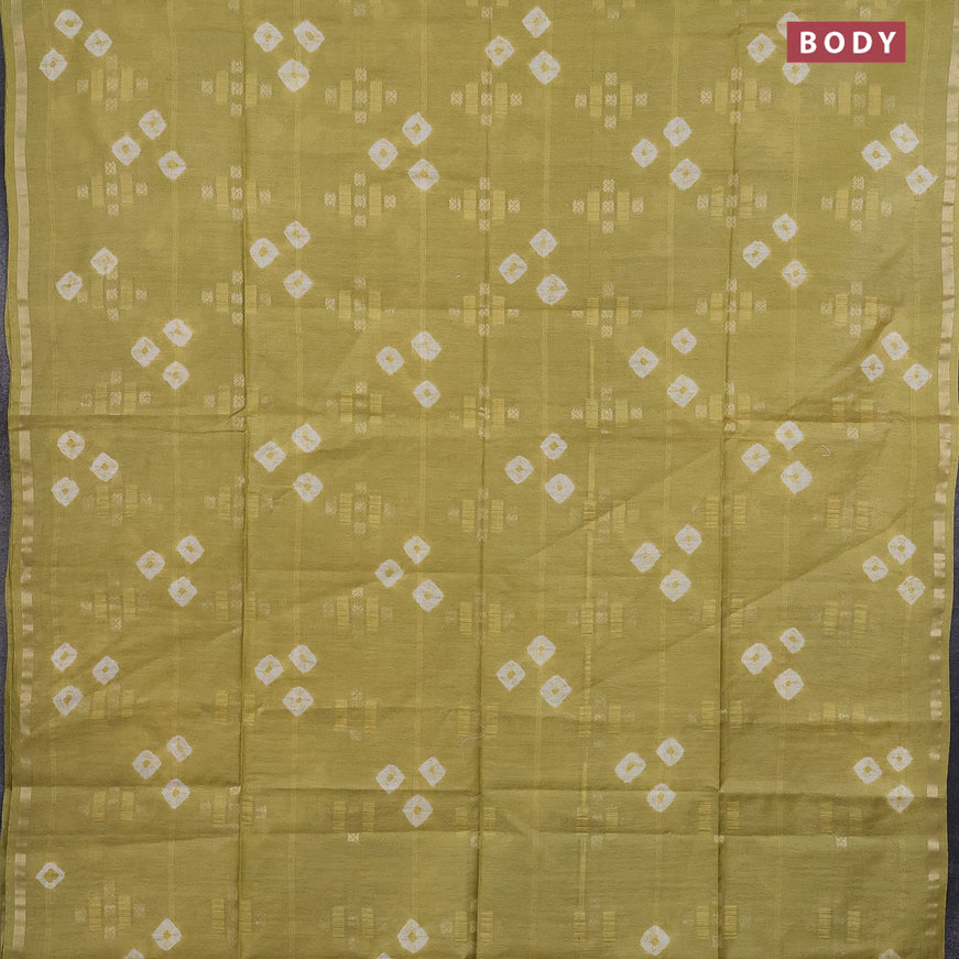 Bamboo saree green shade with zari woven buttas & batik butta prints and small zari woven border