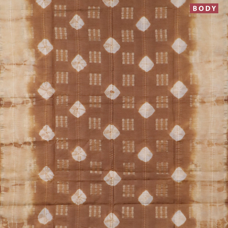 Bamboo saree brown and cream with allover zari woven buttas & batik prints and small zari woven border