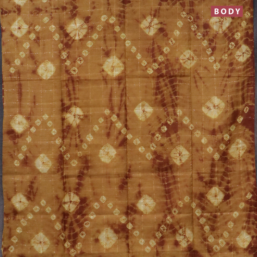 Bamboo saree yellow shade and brown with allover sequin work & tie and dye prints in borderless style