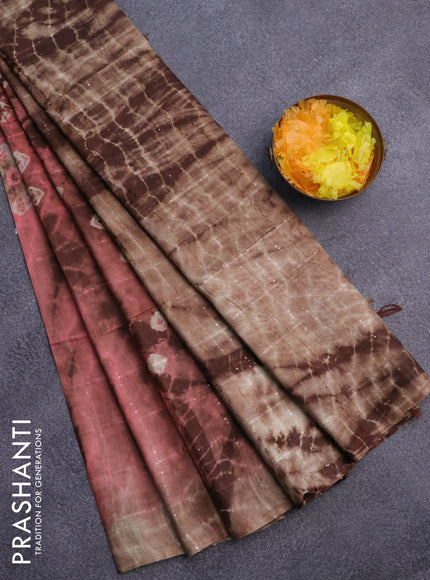 Bamboo saree peach shade and brown with allover sequin work & batik prints in borderless style