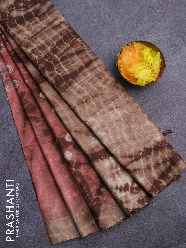 Bamboo saree peach shade and brown with allover sequin work & batik prints in borderless style