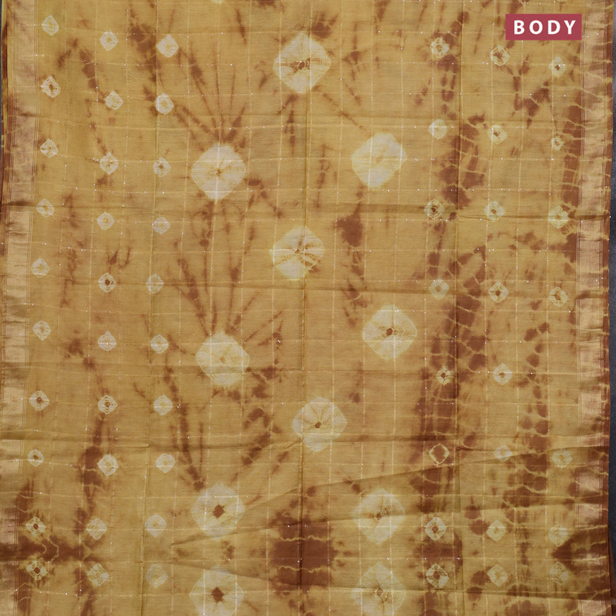 Bamboo saree mustard shade and brown with allover sequin work & batik prints and zari woven border