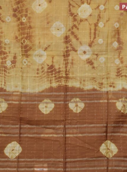 Bamboo saree mustard shade and brown with allover sequin work & batik prints and zari woven border