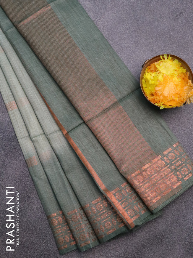 Bamboo saree pastel green and sap green with copper zari woven buttas and copper zari woven border