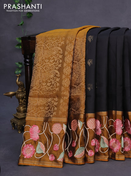 Kanchipuram soft silk saree black and mustard shade with zari woven buttas and pichwai design embroidery work border