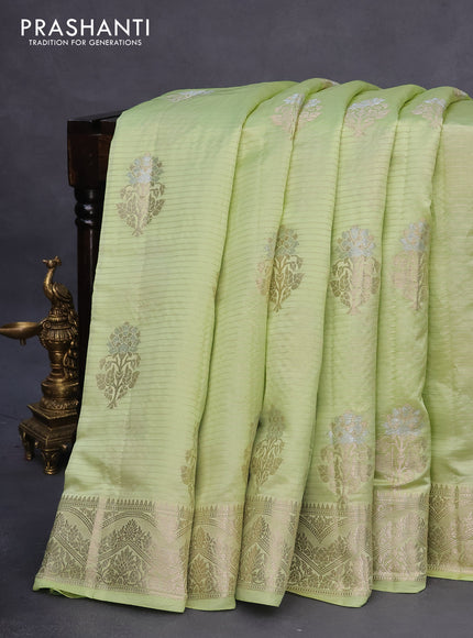 Banarasi poona silk saree pista green with allover zari stripe & buttas and zari woven border