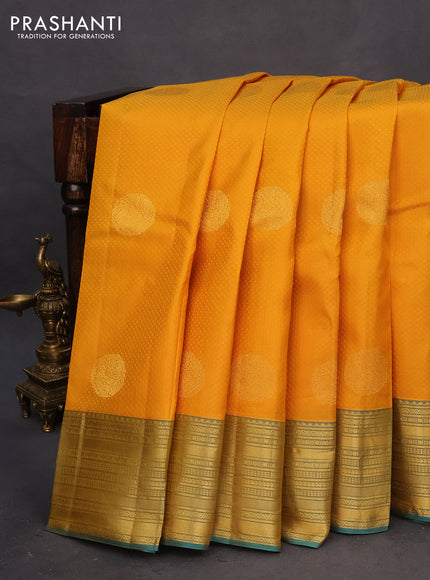 Pure kanchipuram silk saree mango yellow and teal green with self emboss & zari buttas and zari woven border