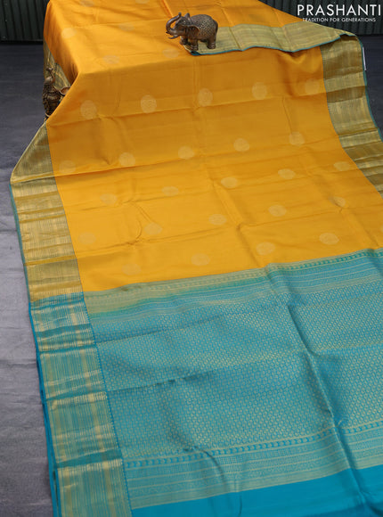 Pure kanchipuram silk saree mango yellow and teal green with self emboss & zari buttas and zari woven border