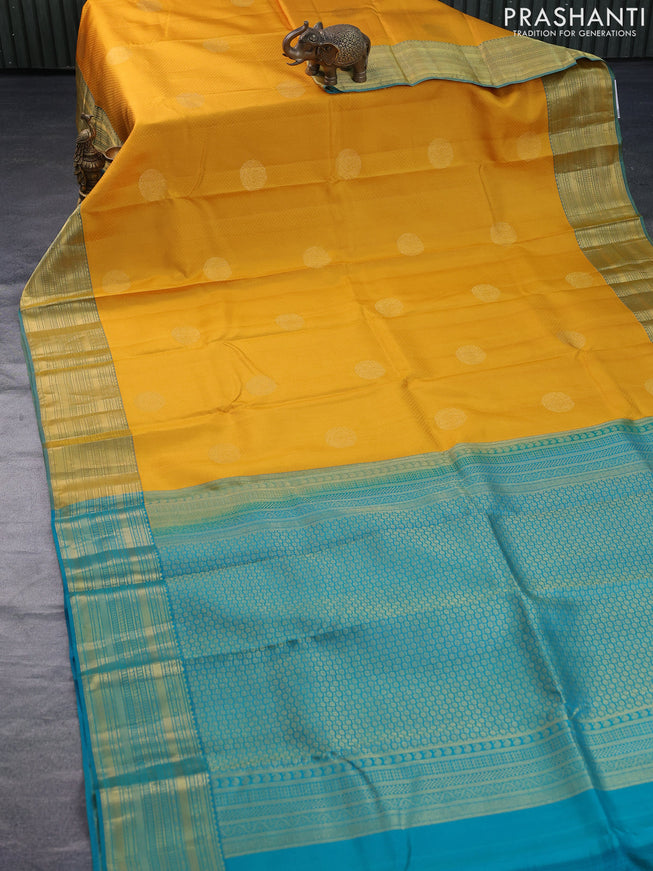 Pure kanchipuram silk saree mango yellow and teal green with self emboss & zari buttas and zari woven border