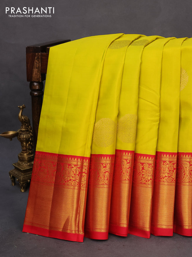 Pure kanchipuram silk saree lime yellow and red with zari woven buttas and long zari woven korvai border