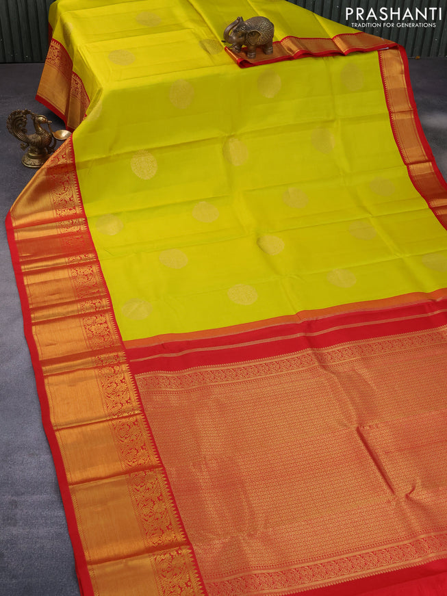 Pure kanchipuram silk saree lime yellow and red with zari woven buttas and long zari woven korvai border