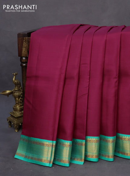 Pure kanchipuram silk saree dark pink and green with plain body and zari woven korvai border